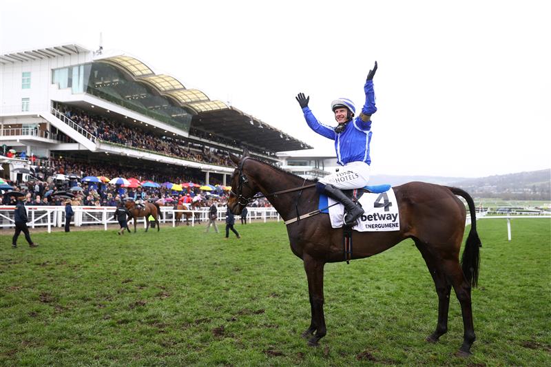CHELTENHAM, ENGLAND - MARCH 15: Paul Townend riding Energumene celebrates victory in the Champion Chase during day two of the Cheltenham Festival 2023 at Cheltenham Racecourse on March 15, 2023 in Cheltenham, England. (Photo by Michael Steele/Getty Images)