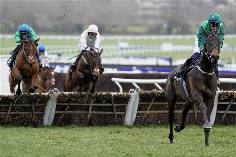 CHELTENHAM, ENGLAND - MARCH 15: Paul Townend riding Impaire Et Passe clear the last to win The Ballymore Novices' Hurdle during day two of the Cheltenham Festival 2023 at Cheltenham Racecourse on March 15, 2023 in Cheltenham, England. (Photo by Alan Crowhurst/Getty Images)