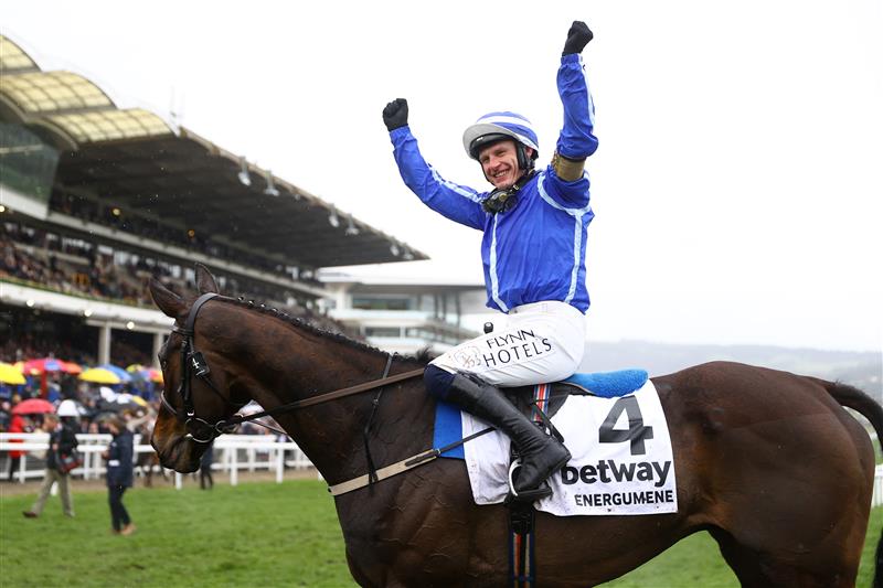 CHELTENHAM, ENGLAND - MARCH 15: Paul Townend riding Energumene celebrates victory in the Champion Chase during day two of the Cheltenham Festival 2023 at Cheltenham Racecourse on March 15, 2023 in Cheltenham, England. (Photo by Michael Steele/Getty Images)