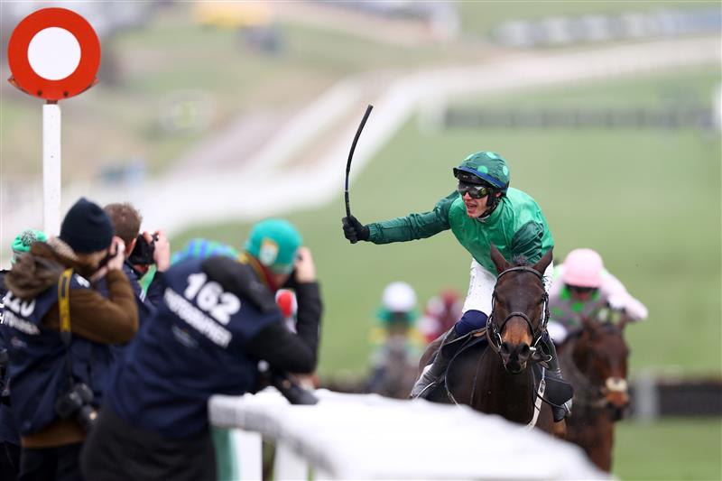 CHELTENHAM, ENGLAND - MARCH 15: Paul Townend riding Impaire Et Passe celebrates winning the Ballymore Novices' Hurdle during day two of the Cheltenham Festival 2023 at Cheltenham Racecourse on March 15, 2023 in Cheltenham, England. (Photo by Michael Steele/Getty Images)