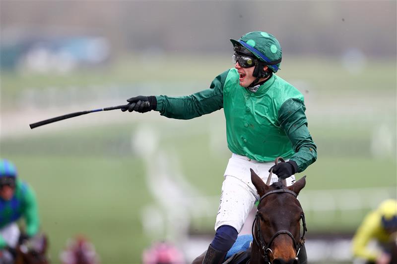 CHELTENHAM, ENGLAND - MARCH 15: Paul Townend riding Impaire Et Passe celebrates winning the Ballymore Novices' Hurdle during day two of the Cheltenham Festival 2023 at Cheltenham Racecourse on March 15, 2023 in Cheltenham, England. (Photo by Michael Steele/Getty Images)