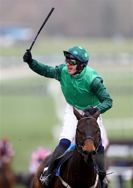 CHELTENHAM, ENGLAND - MARCH 15: Paul Townend riding Impaire Et Passe celebrates winning the Ballymore Novices' Hurdle during day two of the Cheltenham Festival 2023 at Cheltenham Racecourse on March 15, 2023 in Cheltenham, England. (Photo by Michael Steele/Getty Images)
