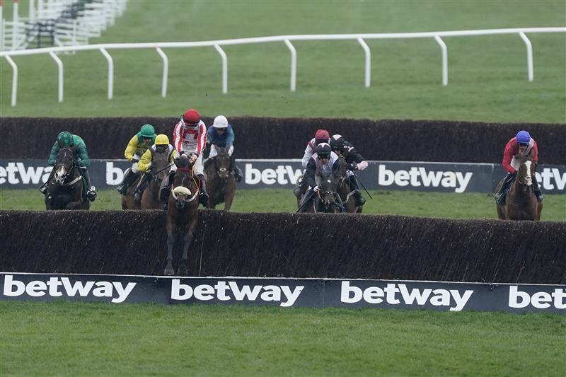 CHELTENHAM, ENGLAND - MARCH 15: Sam Twiston-Davies riding The Real Whacker (red/white) clear the last to win The Brown Advisory Novices' Chase during day two of the Cheltenham Festival 2023 at Cheltenham Racecourse on March 15, 2023 in Cheltenham, England. (Photo by Alan Crowhurst/Getty Images)