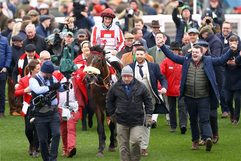 CHELTENHAM, ENGLAND - MARCH 15: Sam Twiston-Davies riding The Real Whacker celebrates winning the Brown Advisory Novices' Chase during day two of the Cheltenham Festival 2023 at Cheltenham Racecourse on March 15, 2023 in Cheltenham, England. (Photo by Michael Steele/Getty Images)
