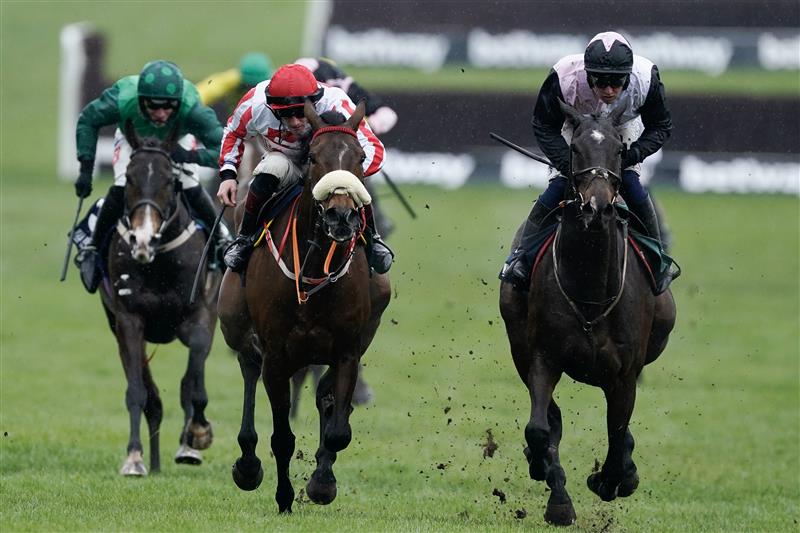 CHELTENHAM, ENGLAND - MARCH 15: Sam Twiston-Davies riding The Real Whacker (red/white) clear the last to win The Brown Advisory Novices' Chase during day two of the Cheltenham Festival 2023 at Cheltenham Racecourse on March 15, 2023 in Cheltenham, England. (Photo by Alan Crowhurst/Getty Images)