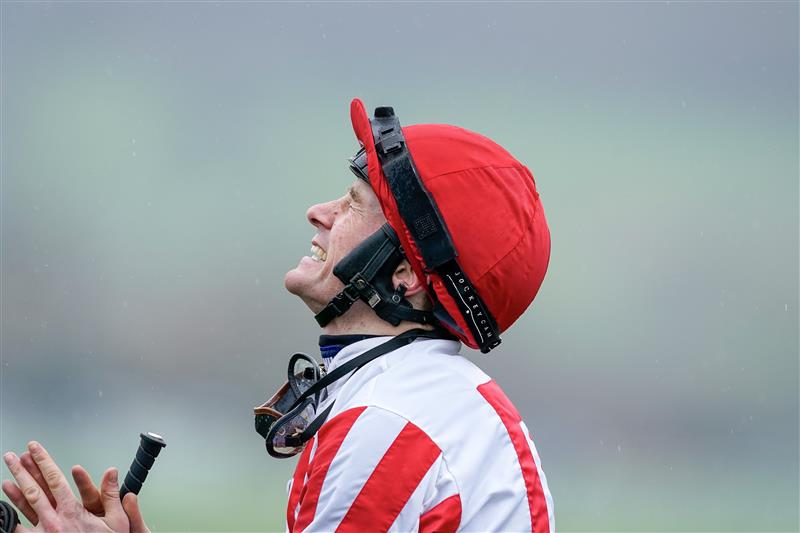 CHELTENHAM, ENGLAND - MARCH 15: Sam Twiston-Davies prays for the photo finish to go his way after riding The Real Whacker to win The Brown Advisory Novices' Chase during day two of the Cheltenham Festival 2023 at Cheltenham Racecourse on March 15, 2023 in Cheltenham, England. (Photo by Alan Crowhurst/Getty Images)