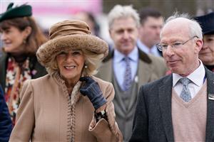 CHELTENHAM, ENGLAND - MARCH 15: Camilla, Queen Consort arrives at the track during day two of the Cheltenham Festival 2023 at Cheltenham Racecourse on March 15, 2023 in Cheltenham, England. (Photo by Alan Crowhurst/Getty Images)
