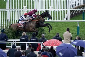 CHELTENHAM, ENGLAND - MARCH 15: Keith Donoghue riding Delta Work (maroon) clear the last to win The Glenfarclas Chase from Davy Russell and Galvin during day two of the Cheltenham Festival 2023 at Cheltenham Racecourse on March 15, 2023 in Cheltenham, England. (Photo by Alan Crowhurst/Getty Images)