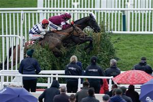 CHELTENHAM, ENGLAND - MARCH 15: Keith Donoghue riding Delta Work (maroon) clear the last to win The Glenfarclas Chase from Davy Russell and Galvin during day two of the Cheltenham Festival 2023 at Cheltenham Racecourse on March 15, 2023 in Cheltenham, England. (Photo by Alan Crowhurst/Getty Images)