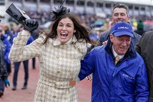 CHELTENHAM, ENGLAND - MARCH 15: Winning connections from the owners and stable staff celebrate the victory of Harry Skelton riding Langer Dan to victory in The Coral Cup Handicap Hurdle during day two of the Cheltenham Festival 2023 at Cheltenham Racecourse on March 15, 2023 in Cheltenham, England. (Photo by Alan Crowhurst/Getty Images)