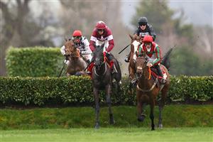 CHELTENHAM, ENGLAND - MARCH 15: Keith Donoghue riding Delta Work competes in the Cross Country Chase during day two of the Cheltenham Festival 2023 at Cheltenham Racecourse on March 15, 2023 in Cheltenham, England. (Photo by Michael Steele/Getty Images)