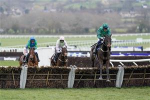 CHELTENHAM, ENGLAND - MARCH 15: Paul Townend riding Impaire Et Passe clear the last to win The Ballymore Novices' Hurdle during day two of the Cheltenham Festival 2023 at Cheltenham Racecourse on March 15, 2023 in Cheltenham, England. (Photo by Alan Crowhurst/Getty Images)