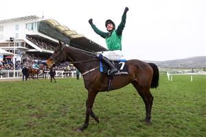 CHELTENHAM, ENGLAND - MARCH 15: Paul Townend riding Impaire Et Passe celebrates winning the Ballymore Novices' Hurdle during day two of the Cheltenham Festival 2023 at Cheltenham Racecourse on March 15, 2023 in Cheltenham, England. (Photo by Michael Steele/Getty Images)