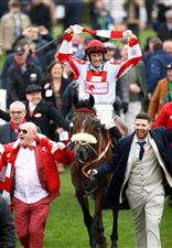 CHELTENHAM, ENGLAND - MARCH 15: Sam Twiston-Davies riding The Real Whacker celebrates winning the Brown Advisory Novices' Chase during day two of the Cheltenham Festival 2023 at Cheltenham Racecourse on March 15, 2023 in Cheltenham, England. (Photo by Michael Steele/Getty Images)
