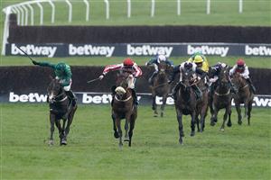 CHELTENHAM, ENGLAND - MARCH 15: Sam Twiston-Davies riding The Real Whacker (red/white) clear the last to win The Brown Advisory Novices' Chase during day two of the Cheltenham Festival 2023 at Cheltenham Racecourse on March 15, 2023 in Cheltenham, England. (Photo by Alan Crowhurst/Getty Images)