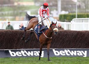 CHELTENHAM, ENGLAND - MARCH 15: Sam Twiston-Davies riding The Real Whacker clears the final fence to win the Brown Advisory Novices' Chase during day two of the Cheltenham Festival 2023 at Cheltenham Racecourse on March 15, 2023 in Cheltenham, England. (Photo by Michael Steele/Getty Images)