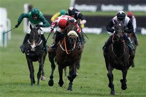 CHELTENHAM, ENGLAND - MARCH 15: Sam Twiston-Davies riding The Real Whacker (red/white) clear the last to win The Brown Advisory Novices' Chase during day two of the Cheltenham Festival 2023 at Cheltenham Racecourse on March 15, 2023 in Cheltenham, England. (Photo by Alan Crowhurst/Getty Images)