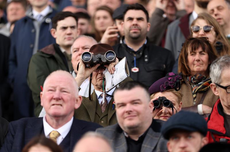 CHELTENHAM, ENGLAND - MARCH 17: Racegoers look on during the McCoy Contractors County Handicap Hurdle during day four of the Cheltenham Festival 2023 at Cheltenham Racecourse on March 17, 2023 in Cheltenham, England. (Photo by Ryan Pierse/Getty Images)