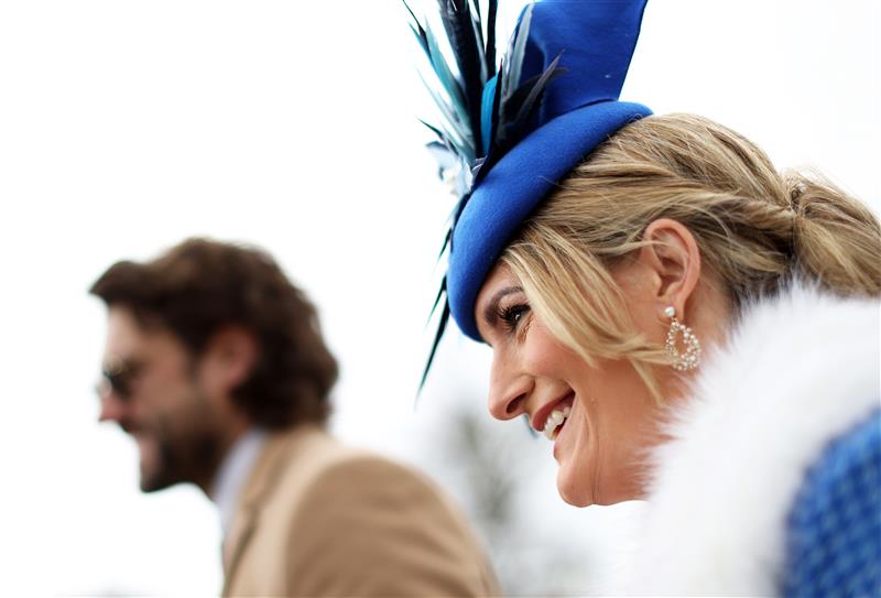 CHELTENHAM, ENGLAND - MARCH 17: Racegoers arrive ahead of day four of the Cheltenham Festival 2023 at Cheltenham Racecourse on March 17, 2023 in Cheltenham, England. (Photo by Ryan Pierse/Getty Images)