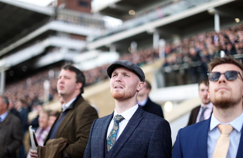 CHELTENHAM, ENGLAND - MARCH 17: Racegoers look on during the McCoy Contractors County Handicap Hurdle during day four of the Cheltenham Festival 2023 at Cheltenham Racecourse on March 17, 2023 in Cheltenham, England. (Photo by Ryan Pierse/Getty Images)
