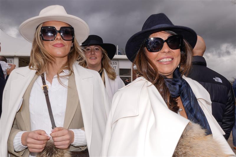 CHELTENHAM, ENGLAND - MARCH 17: Racegoers and fashion during day four of the Cheltenham Festival 2023 at Cheltenham Racecourse on March 17, 2023 in Cheltenham, England. (Photo by Alan Crowhurst/Getty Images)