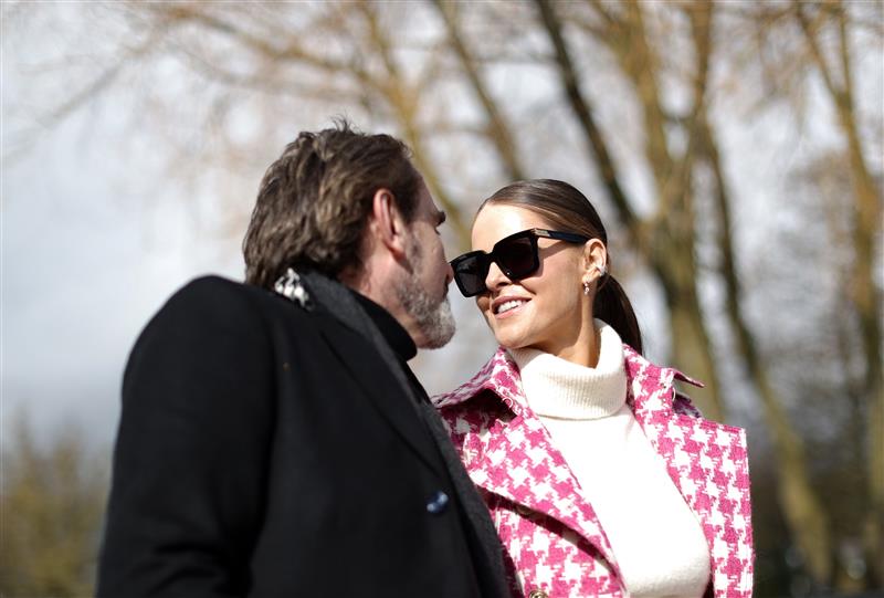 CHELTENHAM, ENGLAND - MARCH 17: Fashion Designer Jade Holland Cooper arrives alongside Husband Julian Dunkerton ahead of day four of the Cheltenham Festival 2023 at Cheltenham Racecourse on March 17, 2023 in Cheltenham, England. (Photo by Ryan Pierse/Getty Images)
