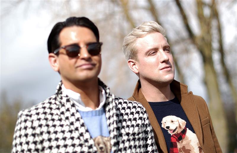 CHELTENHAM, ENGLAND - MARCH 17: Ollie Locke and Husband Gareth Locke arrive ahead of day four of the Cheltenham Festival 2023 at Cheltenham Racecourse on March 17, 2023 in Cheltenham, England. (Photo by Ryan Pierse/Getty Images)