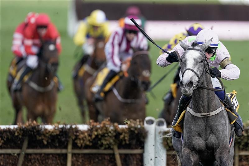 CHELTENHAM, ENGLAND - MARCH 17: Paul Townend riding Lossiemouth (pink) clear the last to win The JCB Triumph Hurdle during day four of the Cheltenham Festival 2023 at Cheltenham Racecourse on March 17, 2023 in Cheltenham, England. (Photo by Alan Crowhurst/Getty Images)