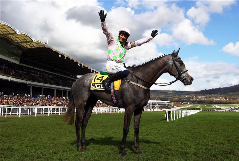 CHELTENHAM, ENGLAND - MARCH 17: Paul Townend celebrates on board Lossiemouth after winning the JCB Triumph Hurdle during day four of the Cheltenham Festival 2023 at Cheltenham Racecourse on March 17, 2023 in Cheltenham, England. (Photo by Michael Steele/Getty Images)