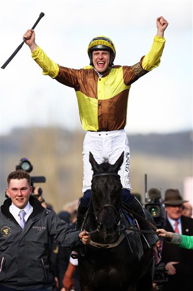 CHELTENHAM, ENGLAND - MARCH 17: Paul Townend on board Galopin Des Champs celebrate after winning the Boodles Cheltenham Gold Cup Chase during day four of the Cheltenham Festival 2023 at Cheltenham Racecourse on March 17, 2023 in Cheltenham, England. (Photo by Ryan Pierse/Getty Images)