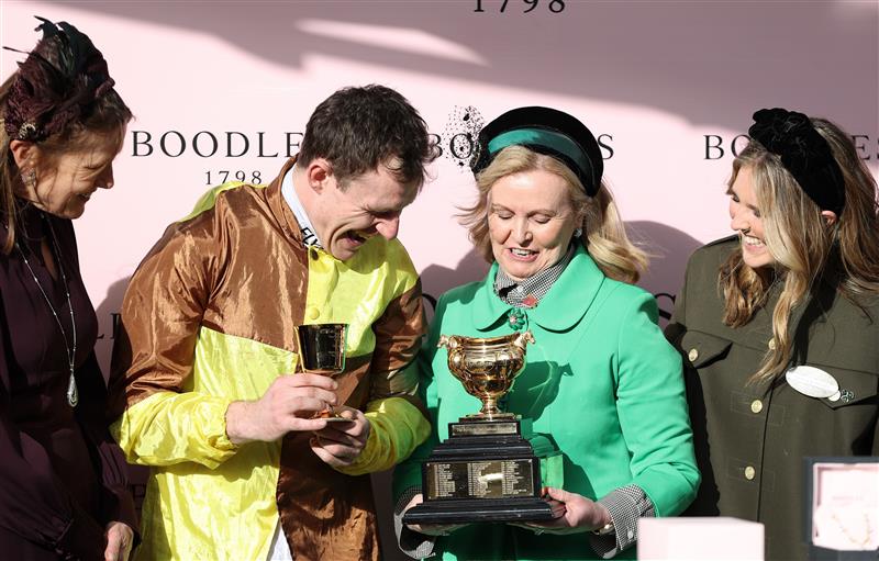 CHELTENHAM, ENGLAND - MARCH 17: Paul Townend celebrates after winning the Boodles Cheltenham Gold Cup Chase on board Galopin Des Champs alongside Owner Mrs Audrey Turley during day four of the Cheltenham Festival 2023 at Cheltenham Racecourse on March 17, 2023 in Cheltenham, England. (Photo by Ryan Pierse/Getty Images)