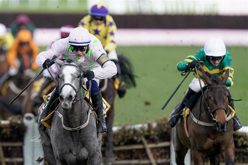 CHELTENHAM, ENGLAND - MARCH 17: Paul Townend riding Lossiemouth (pink) clear the last to win The JCB Triumph Hurdle during day four of the Cheltenham Festival 2023 at Cheltenham Racecourse on March 17, 2023 in Cheltenham, England. (Photo by Alan Crowhurst/Getty Images)