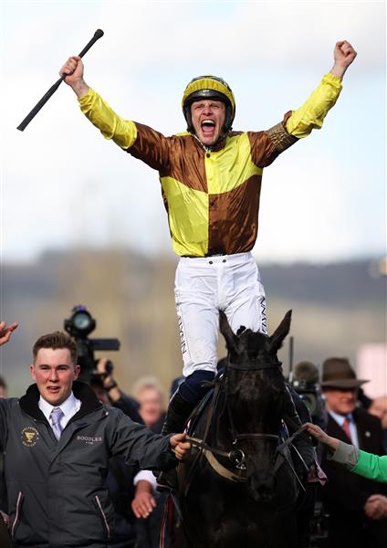 CHELTENHAM, ENGLAND - MARCH 17: Paul Townend on board Galopin Des Champs celebrate after winning the Boodles Cheltenham Gold Cup Chase during day four of the Cheltenham Festival 2023 at Cheltenham Racecourse on March 17, 2023 in Cheltenham, England. (Photo by Ryan Pierse/Getty Images)