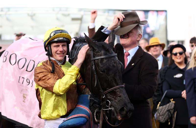 CHELTENHAM, ENGLAND - MARCH 17: Paul Townend poses alongside Trainer Willie Mullins after winning the Boodles Cheltenham Gold Cup Chase on board Galopin Des Champs during day four of the Cheltenham Festival 2023 at Cheltenham Racecourse on March 17, 2023 in Cheltenham, England. (Photo by Ryan Pierse/Getty Images)