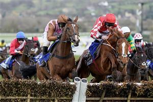 CHELTENHAM, ENGLAND - MARCH 17: Bridget Andrews riding Faivoir (L, brown) clear the last to win The McCoy Contractors County Handicap Hurdle during day four of the Cheltenham Festival 2023 at Cheltenham Racecourse on March 17, 2023 in Cheltenham, England. (Photo by Alan Crowhurst/Getty Images)