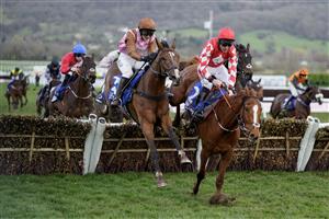 CHELTENHAM, ENGLAND - MARCH 17: Bridget Andrews riding Faivoir (L, brown) clear the last to win The McCoy Contractors County Handicap Hurdle during day four of the Cheltenham Festival 2023 at Cheltenham Racecourse on March 17, 2023 in Cheltenham, England. (Photo by Alan Crowhurst/Getty Images)