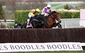 CHELTENHAM, ENGLAND - MARCH 17: Paul Townend on board Galopin Des Champs (L) jumps the last ahead of Harry Cobden on board Bravemansgame on their way to winning the Boodles Cheltenham Gold Cup Chase during day four of the Cheltenham Festival 2023 at Cheltenham Racecourse on March 17, 2023 in Cheltenham, England. (Photo by Ryan Pierse/Getty Images)