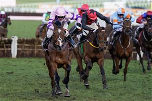 CHELTENHAM, ENGLAND - MARCH 17: Harry Cobden riding Stay Away Fay (pink) clear the last to win The Albert Bartlett Novices' Hurdle during day four of the Cheltenham Festival 2023 at Cheltenham Racecourse on March 17, 2023 in Cheltenham, England. (Photo by Alan Crowhurst/Getty Images)