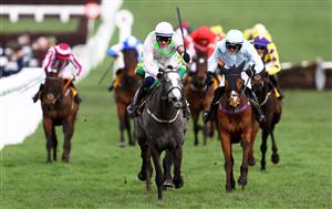 CHELTENHAM, ENGLAND - MARCH 17: Paul Townend celebrates on board Lossiemouth after winning the JCB Triumph Hurdle during day four of the Cheltenham Festival 2023 at Cheltenham Racecourse on March 17, 2023 in Cheltenham, England. (Photo by Michael Steele/Getty Images)