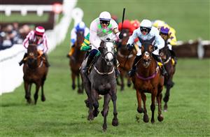CHELTENHAM, ENGLAND - MARCH 17: Paul Townend celebrates on board Lossiemouth after winning the JCB Triumph Hurdle during day four of the Cheltenham Festival 2023 at Cheltenham Racecourse on March 17, 2023 in Cheltenham, England. (Photo by Michael Steele/Getty Images)