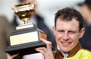 CHELTENHAM, ENGLAND - MARCH 17: Paul Townend poses after winning the Boodles Cheltenham Gold Cup Chase on board Galopin Des Champs during day four of the Cheltenham Festival 2023 at Cheltenham Racecourse on March 17, 2023 in Cheltenham, England. (Photo by Ryan Pierse/Getty Images)