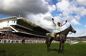 CHELTENHAM, ENGLAND - MARCH 17: Paul Townend celebrates on board Lossiemouth after winning the JCB Triumph Hurdle during day four of the Cheltenham Festival 2023 at Cheltenham Racecourse on March 17, 2023 in Cheltenham, England. (Photo by Michael Steele/Getty Images)