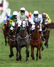 CHELTENHAM, ENGLAND - MARCH 17: Paul Townend celebrates on board Lossiemouth after winning the JCB Triumph Hurdle during day four of the Cheltenham Festival 2023 at Cheltenham Racecourse on March 17, 2023 in Cheltenham, England. (Photo by Michael Steele/Getty Images)