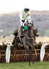 CHELTENHAM, ENGLAND - MARCH 17: Paul Townend on board Lossiemouth jumps the last on their way to winning the JCB Triumph Hurdle during day four of the Cheltenham Festival 2023 at Cheltenham Racecourse on March 17, 2023 in Cheltenham, England. (Photo by Ryan Pierse/Getty Images)