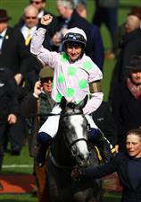 CHELTENHAM, ENGLAND - MARCH 17: Paul Townend celebrates on board Lossiemouth after winning the JCB Triumph Hurdle during day four of the Cheltenham Festival 2023 at Cheltenham Racecourse on March 17, 2023 in Cheltenham, England. (Photo by Michael Steele/Getty Images)