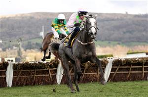 CHELTENHAM, ENGLAND - MARCH 17: Paul Townend on board Lossiemouth jumps the last on their way to winning the JCB Triumph Hurdle during day four of the Cheltenham Festival 2023 at Cheltenham Racecourse on March 17, 2023 in Cheltenham, England. (Photo by Ryan Pierse/Getty Images)