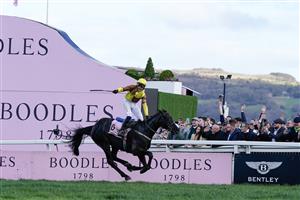 CHELTENHAM, ENGLAND - MARCH 17: Paul Townend riding Galopin Des Champs win The Boodles Cheltenham Gold Cup Chase during day four of the Cheltenham Festival 2023 at Cheltenham Racecourse on March 17, 2023 in Cheltenham, England. (Photo by Alan Crowhurst/Getty Images)