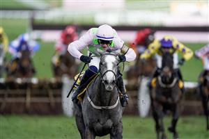 CHELTENHAM, ENGLAND - MARCH 17: Paul Townend riding Lossiemouth (pink) clear the last to win The JCB Triumph Hurdle during day four of the Cheltenham Festival 2023 at Cheltenham Racecourse on March 17, 2023 in Cheltenham, England. (Photo by Alan Crowhurst/Getty Images)