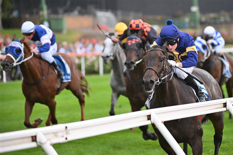 MELBOURNE, AUSTRALIA - MARCH 18: Craig Newitt riding Munhamek winning Race 5, the The Branched Logistics Mugatoo, during Melbourne Racing at Moonee Valley Racecourse on March 18, 2023 in Melbourne, Australia. (Photo by Vince Caligiuri/Getty Images)