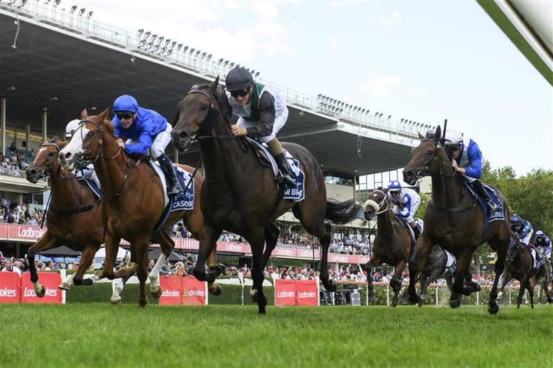 MELBOURNE, AUSTRALIA - MARCH 18: Luke Currie riding Mr Brightside defeats Ben Melham riding Cascadian and David Pires riding The Inevitable in Race 7, the The Sharp Eit All-star Mile, during Melbourne Racing at Moonee Valley Racecourse on March 18, 2023 in Melbourne, Australia. (Photo by Vince Caligiuri/Getty Images)